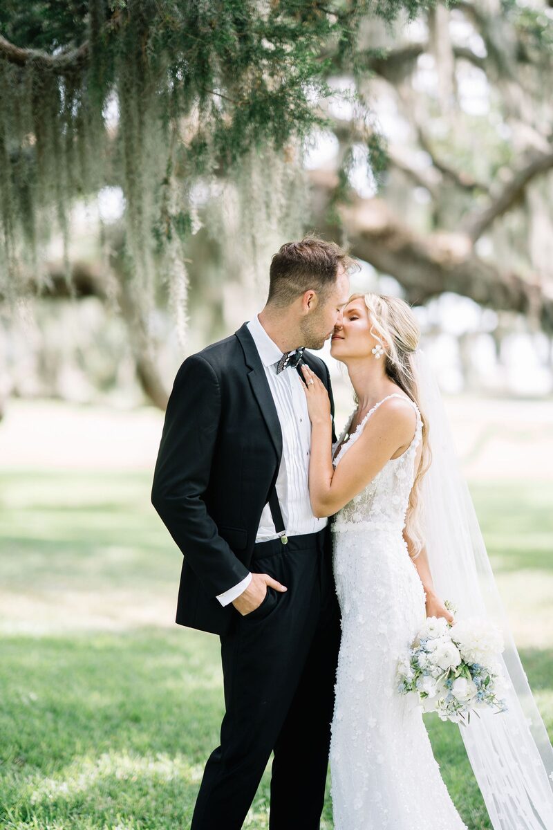 A kiss beneath the Spanish moss